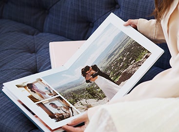 Woman holding opened wedding album