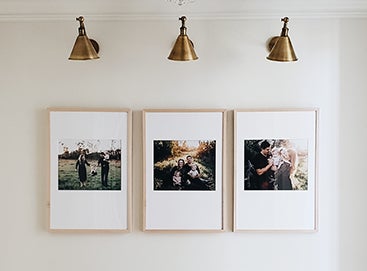 Three Artifact Uprising Modern Metal Frames hanging side by side on wall