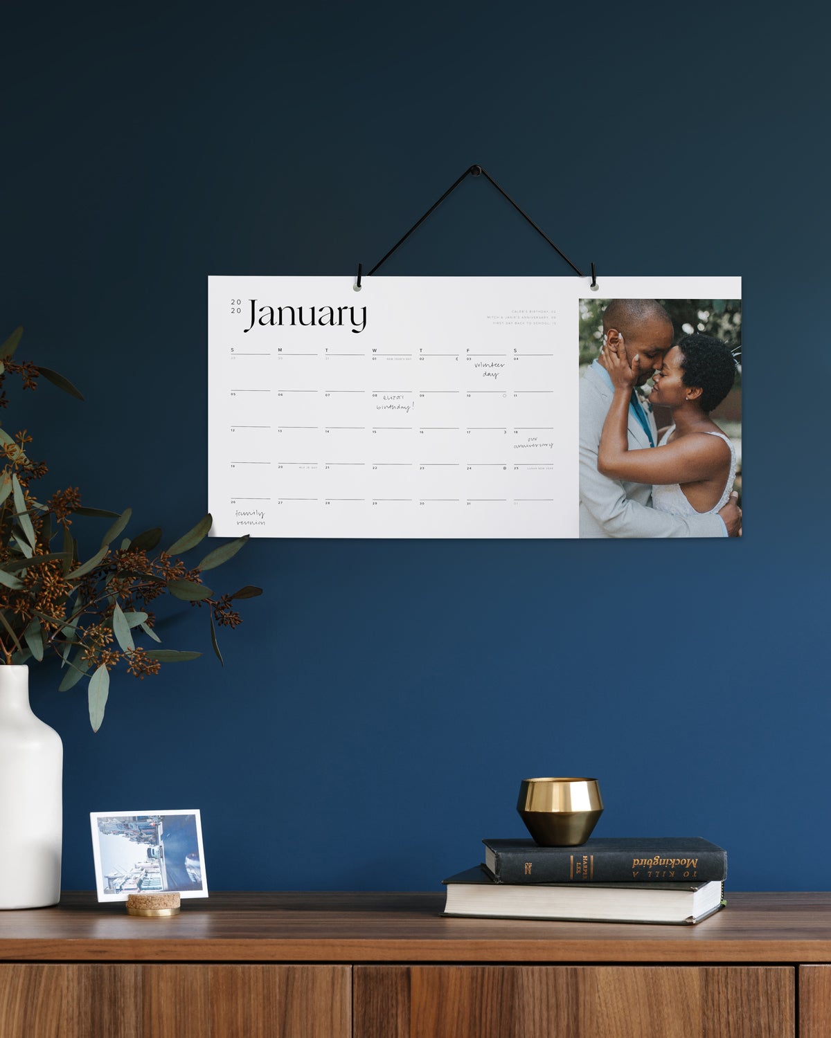 Wall calendar featuring photo of couple embracing on right side