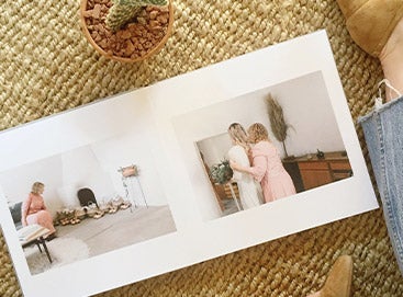 Wedding album opened to photo of mother and bride