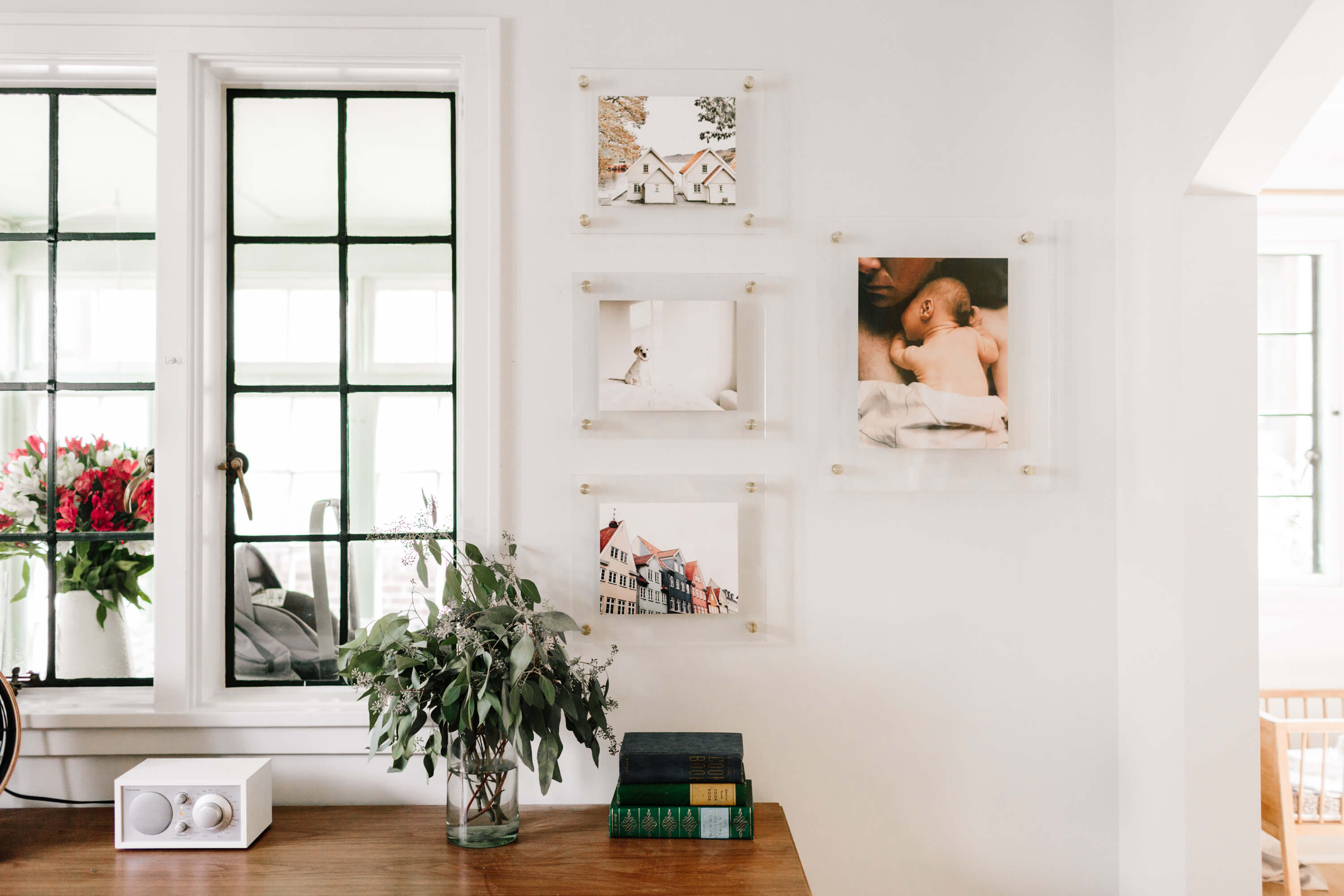 Series of floating frames hung on wall